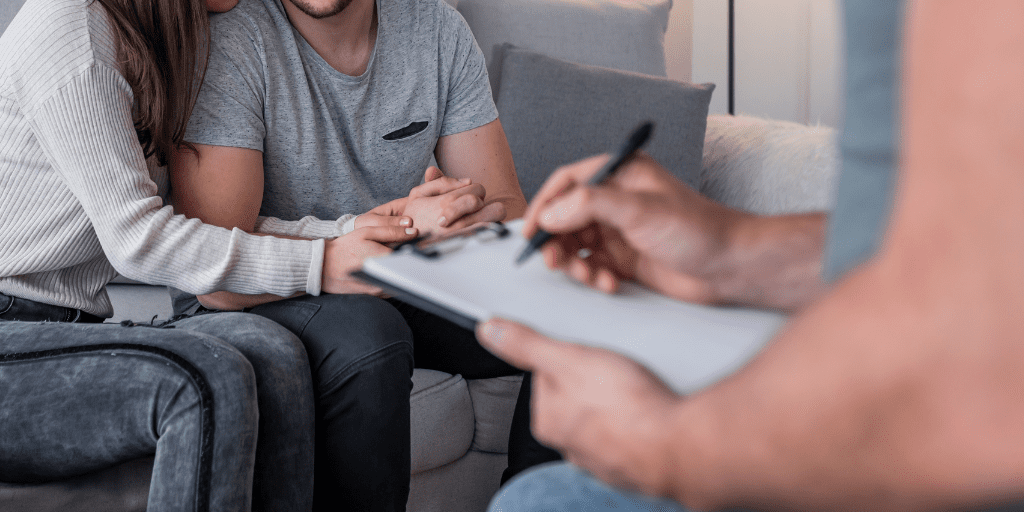 Young couple set in a counselor or doctor's office together