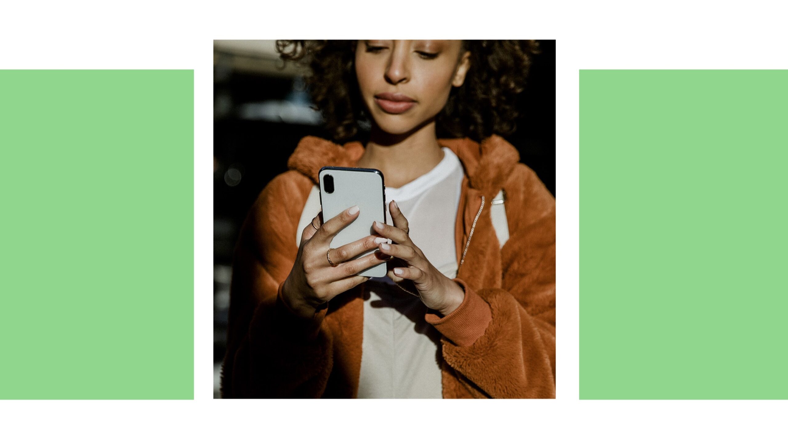 A woman searching on her phone for pregnancy support in Branson West, Missouri